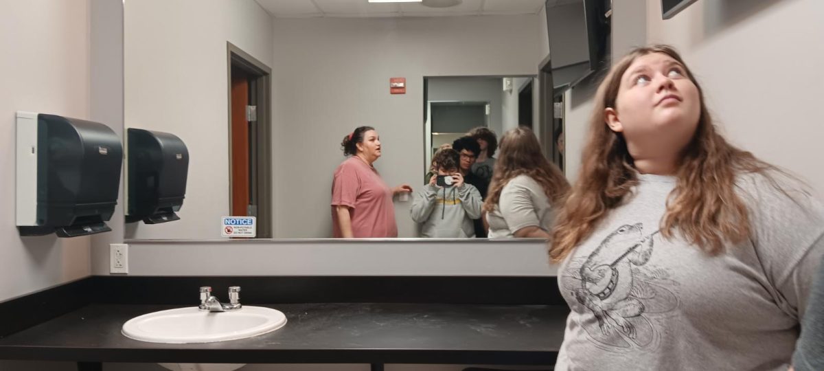 Lilly Bethel looking at the dressing rooms. 