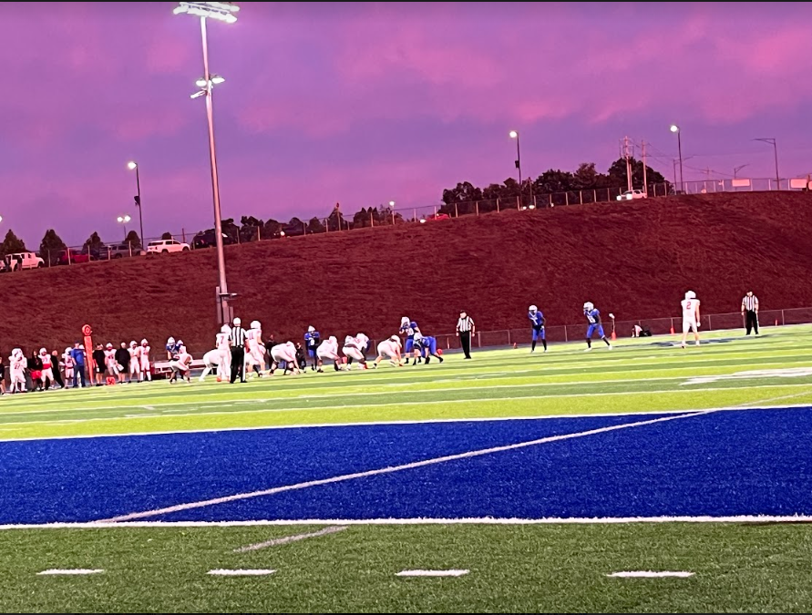 sunset at football game. 